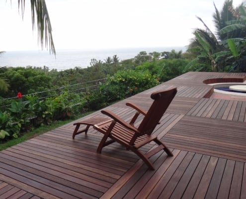 large-batu-deck-tiles Large deck tiles made of batu hardwood look over a tropical coastal view