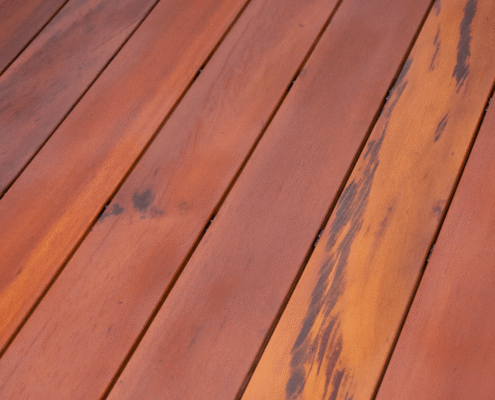 TigerDeck-Close-Up a close up of tigerwood decking fastened with hidden fasteners showing the variegated grain.